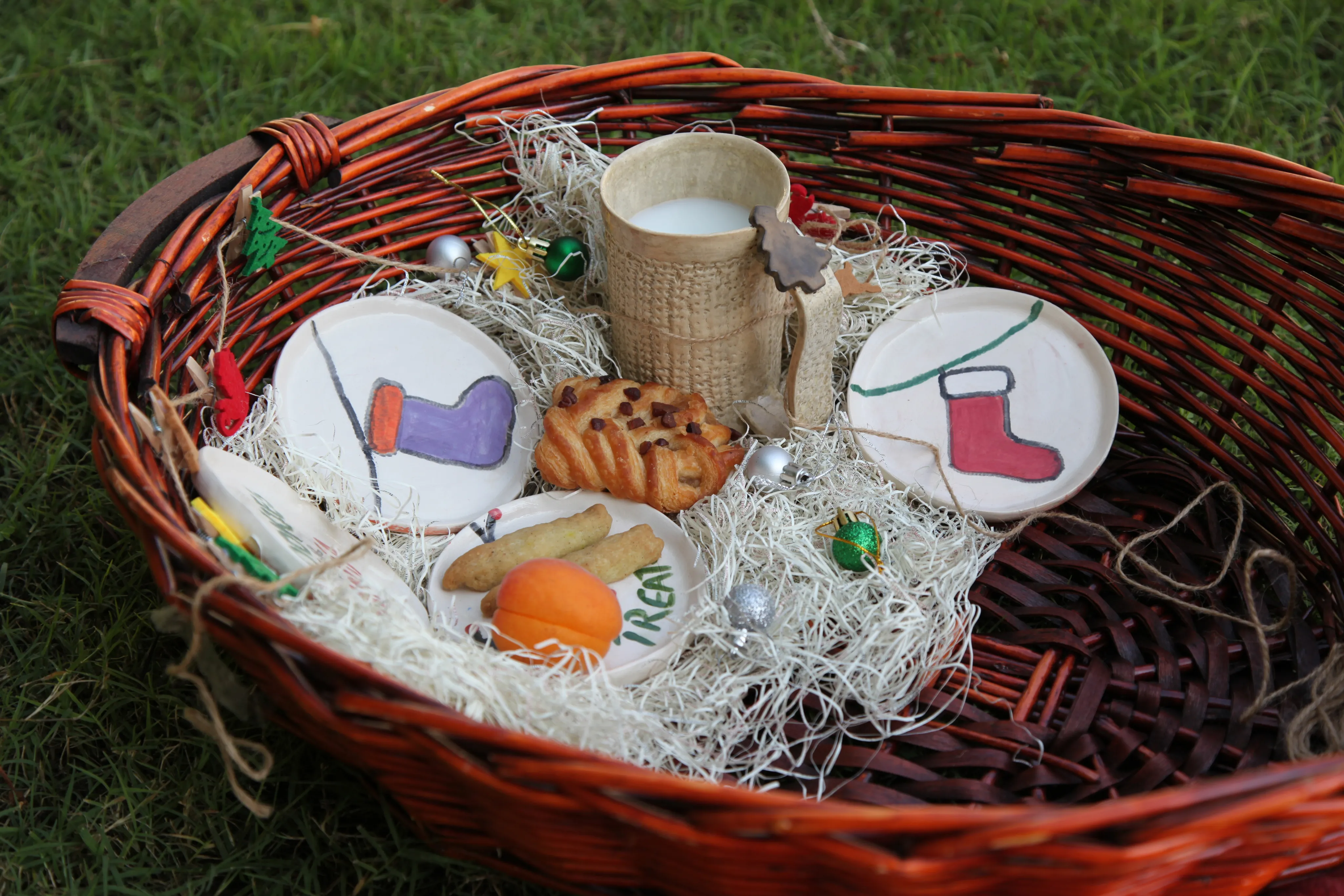 Customized pottery in a gift basket